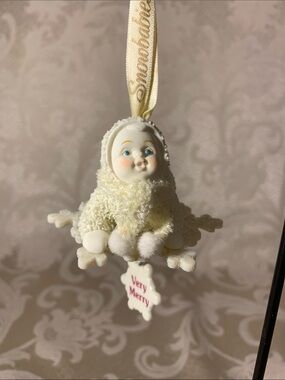 Department 56 Cream Snowflake Baby Ornament with Blue Eyes